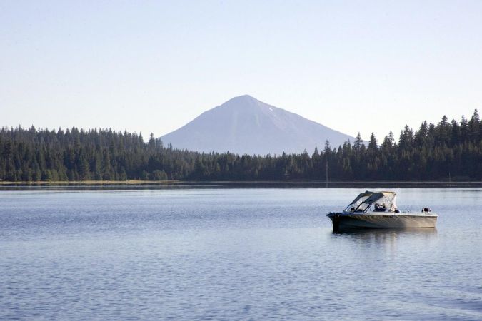 Hyatt Lake with fishing boat and Mount McLoughlin looming beyond