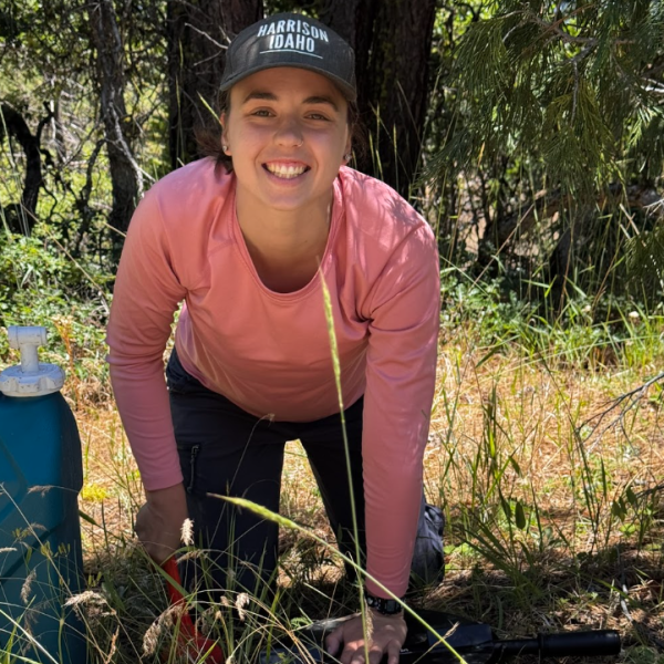 Friends Research Fund grant recipient Andrea Osbon working with a wildlife crossing camera