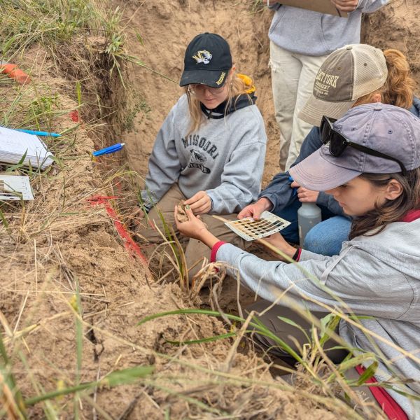 Friends Research Fund grant recipient Andrea Osbon working with a wildlife crossing camera