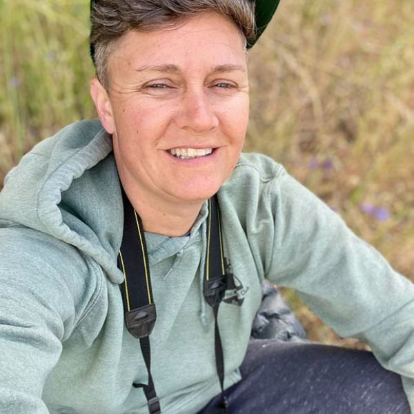 Friends Research Fund grant recipient Andrea Osbon working with a wildlife crossing camera